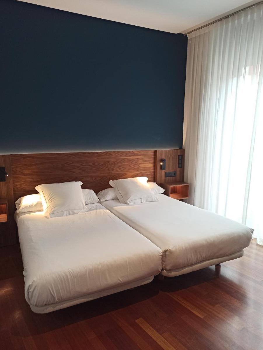 Cama o camas de una habitación en ARVA Spa París