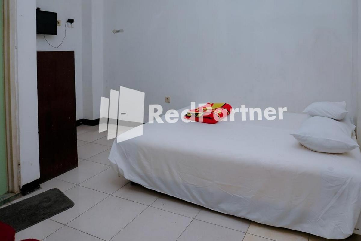 Suitetrails - Sawojajar Inn Mitra RedDoorz