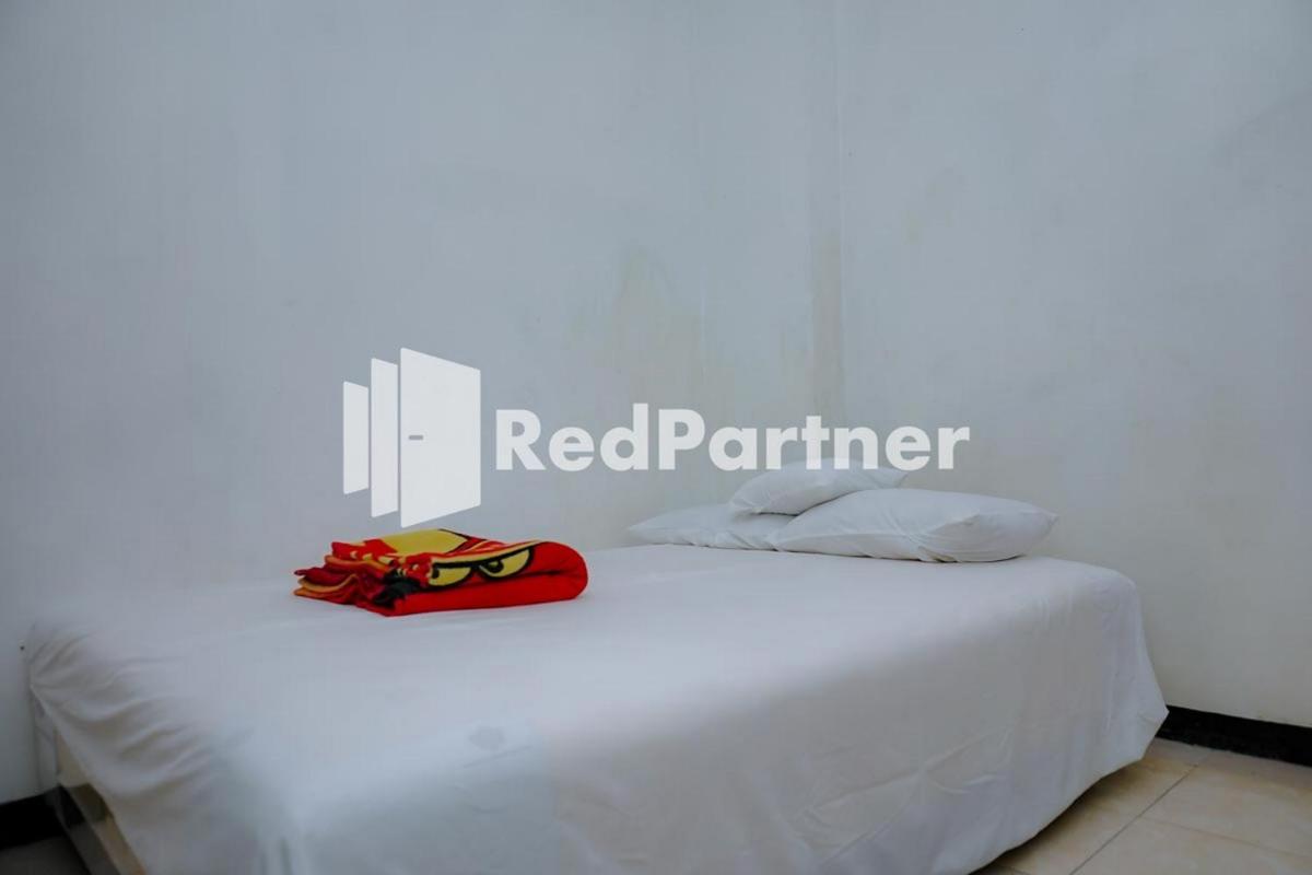 Suitetrails - Sawojajar Inn Mitra RedDoorz