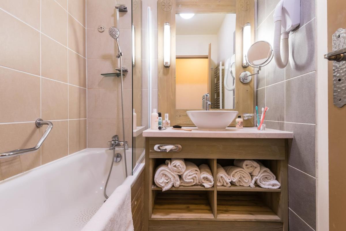 Salle de bains dans l'établissement Résidence Pierre & Vacances Premium Les Terrasses d'Eos