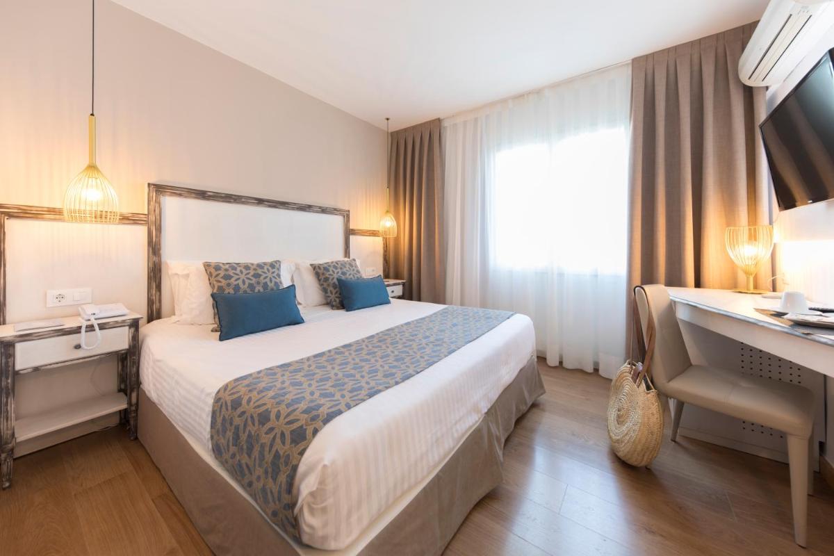 Cama o camas de una habitación en Park Hotel San Jorge & Spa by Escampa Hotels
