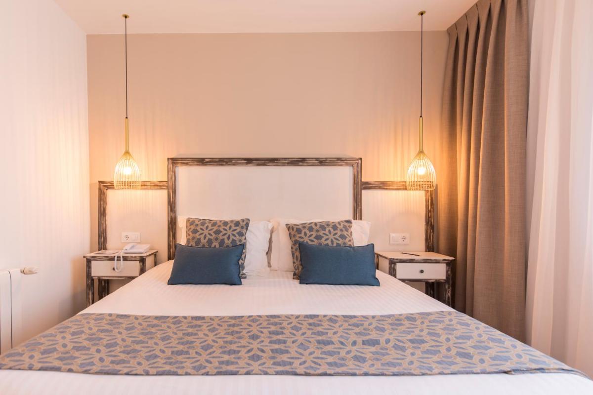 Cama o camas de una habitación en Park Hotel San Jorge & Spa by Escampa Hotels
