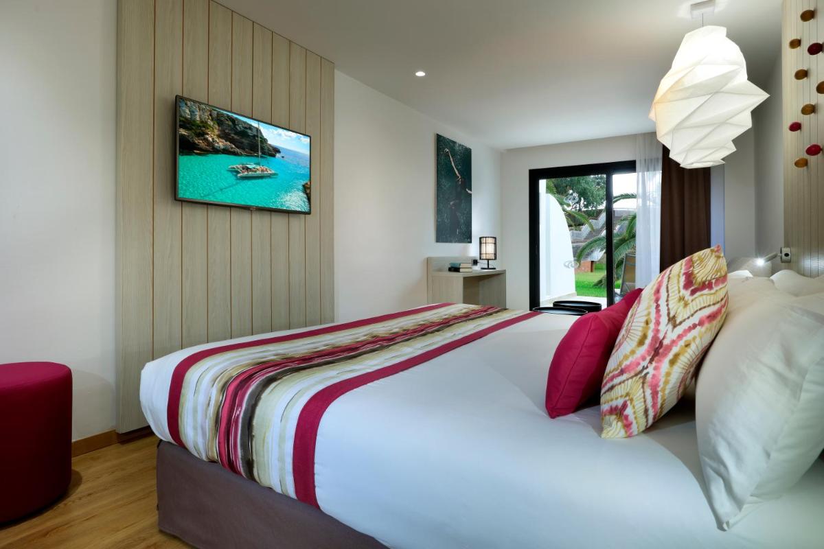 Cama o camas de una habitación en Grand Palladium White Island Resort & Spa - All Inclusive
