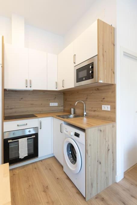Coqueto apartamento en la calle Caribe. A/C WIFI - Housity