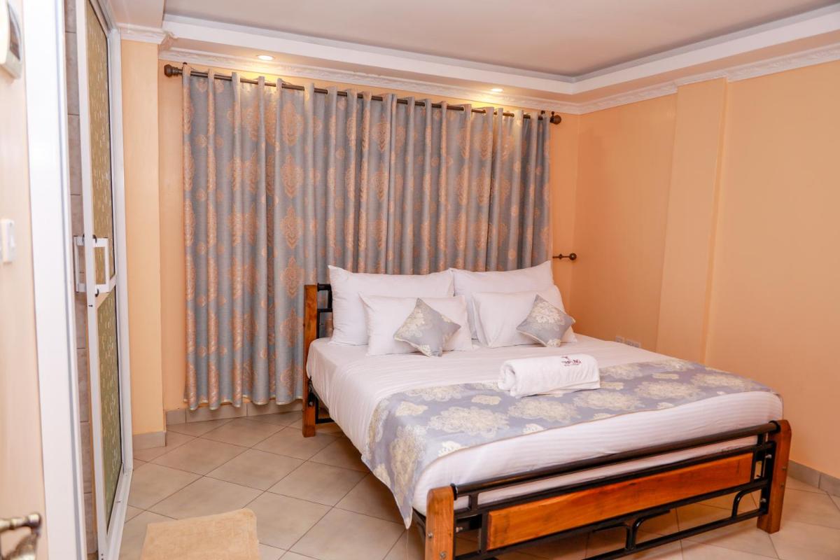 Suitetrails - TRIPLINQ HOTEL & RESORT Meru