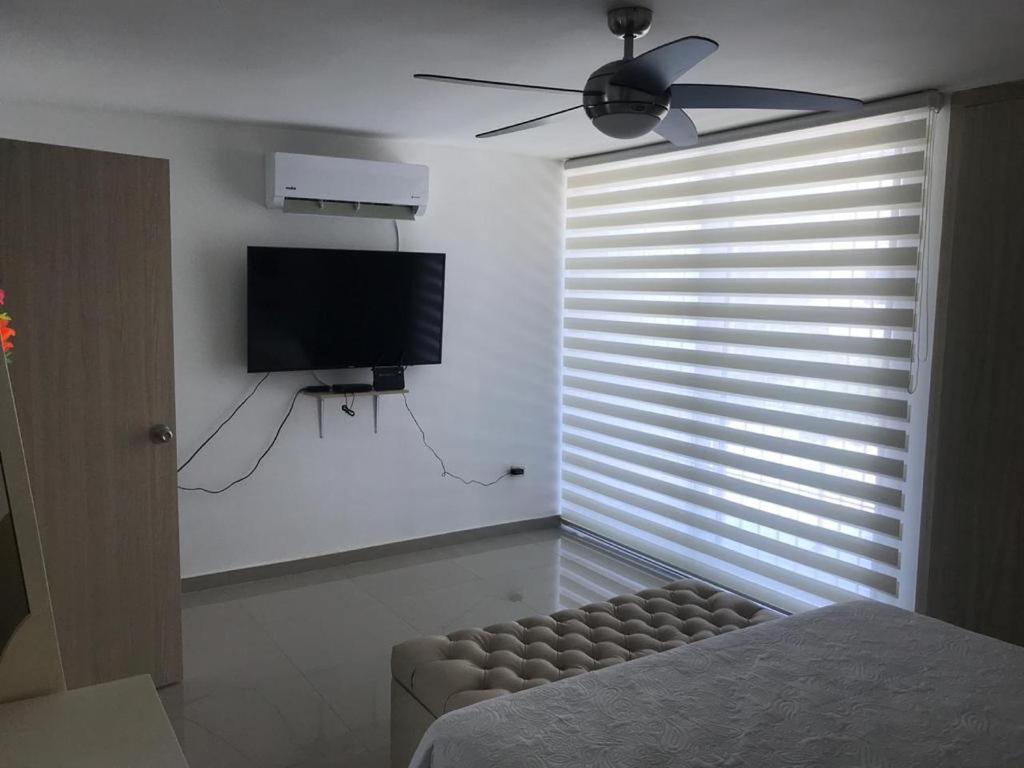 Confortable habitación con baño privado y A/C al lado de la universidad andina - Housity