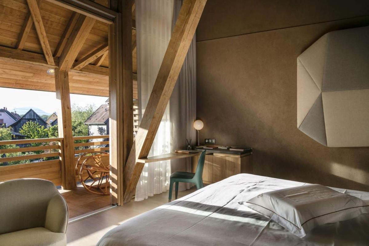 Un ou plusieurs lits dans un hébergement de l'établissement Hotel des Berges, Restaurant Gastronomique & Spa