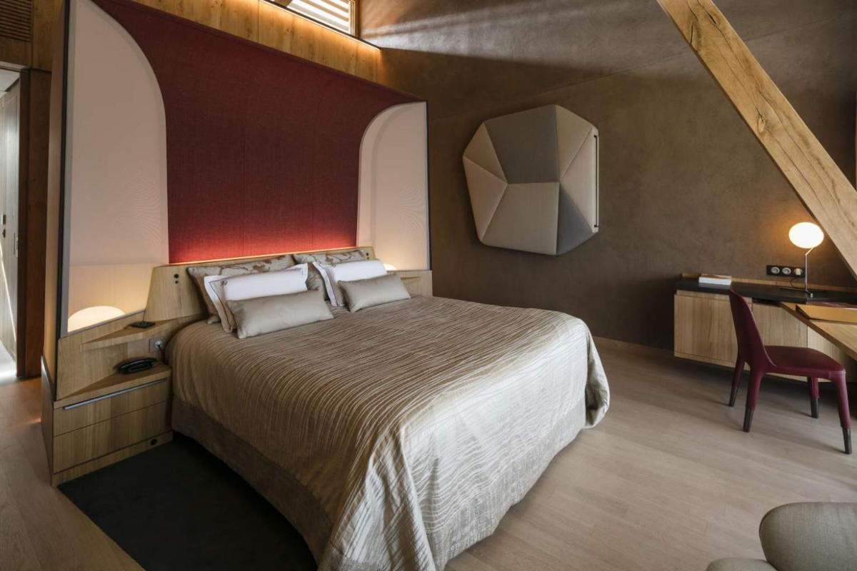 Un ou plusieurs lits dans un hébergement de l'établissement Hotel des Berges, Restaurant Gastronomique & Spa