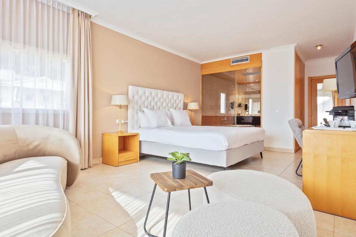 Zona de estar de Van der Valk Hotel Barcarola