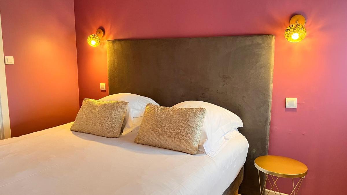 Un ou plusieurs lits dans un hébergement de l'établissement Résidence Hôtelière Natureva & Spa