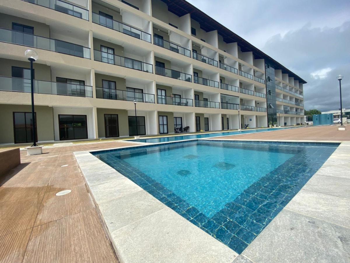 Flat em condomínio pé na areia em Maria Farinha - Housity