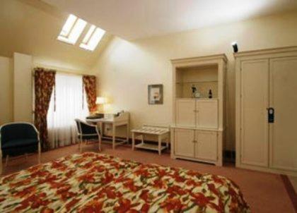 Ein Bett oder Betten in einem Zimmer der Unterkunft Usedom Palace