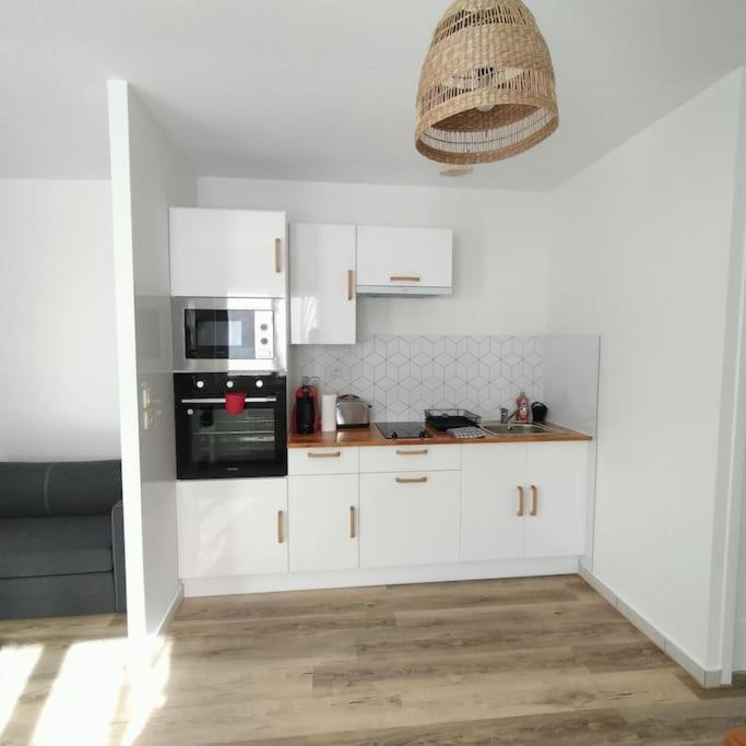 Spacieux studio dans résidence avec parking privé - Housity
