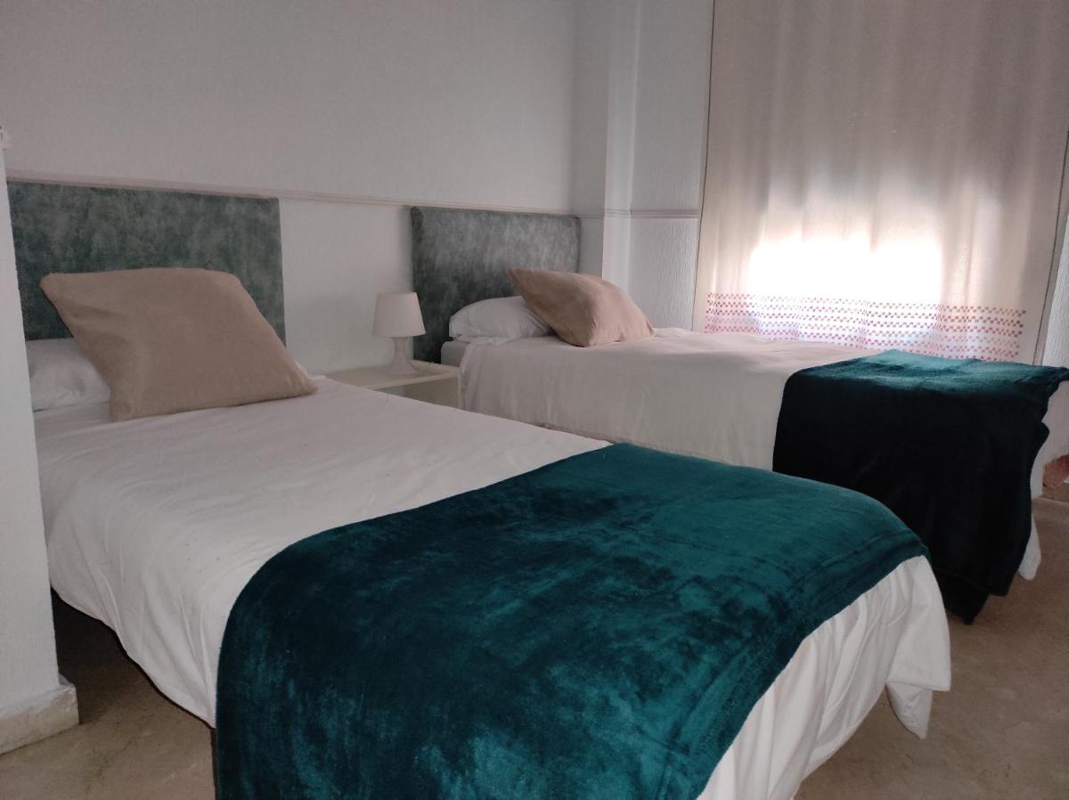 Vive Huelva ARAGON 4 HABITACIONES WIFI 300MB - Housity