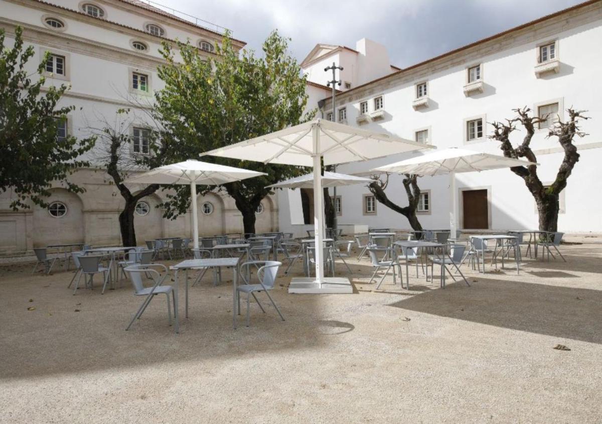 Um restaurante ou outro lugar para comer em Montebelo Mosteiro de Alcobaça Historic Hotel