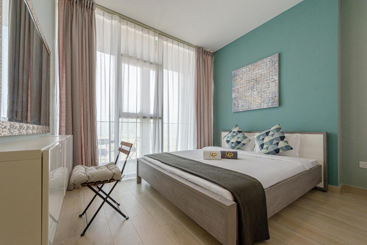 Marco Polo - Park and Skyline Views From this Cozy Apt in JVC - Housity