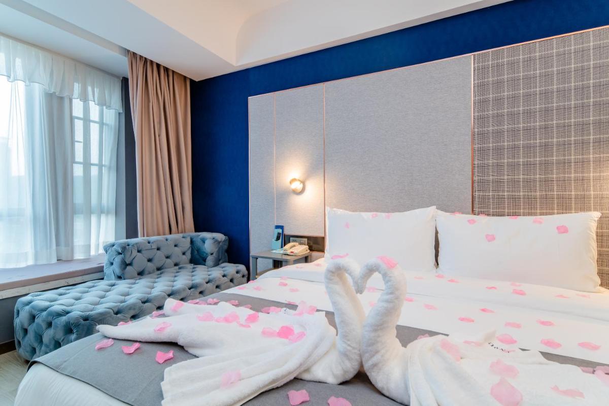 Suitetrails - LanOu Hotel Guiyang Midea State Guest House University Town