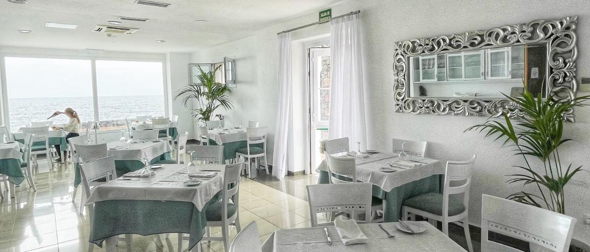 Un restaurante o sitio para comer en Balneario Pozo de la Salud