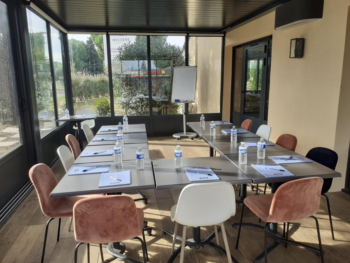 Restaurant ou autre lieu de restauration dans l'établissement Kyriad Carcassonne - Aéroport