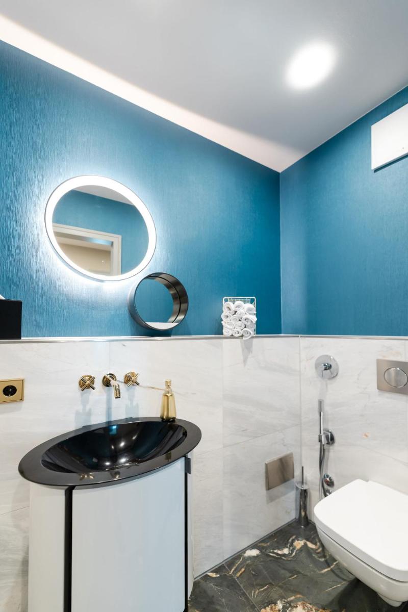 Ein Badezimmer in der Unterkunft Fourty Three Luxury Serviced Apartments