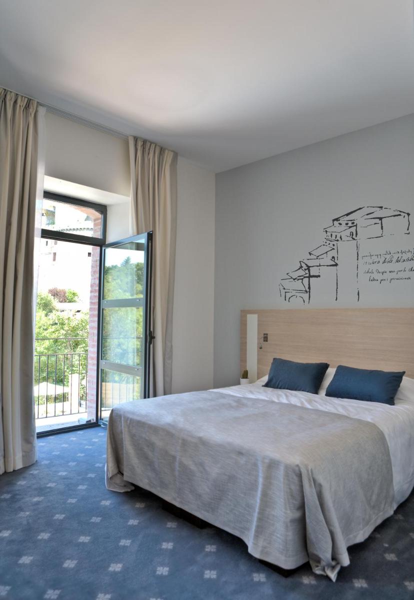 Un ou plusieurs lits dans un hébergement de l'établissement Best Western Plus Villa Saint Antoine Hotel & Spa
