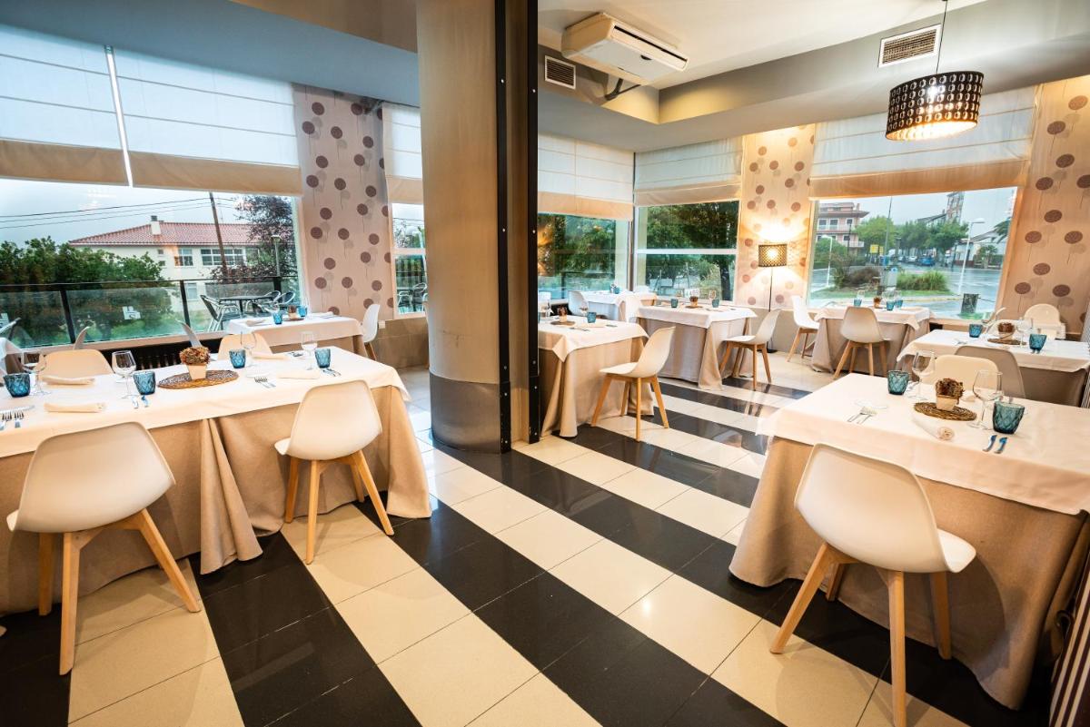 Un restaurante o sitio para comer en Hotel Spa Sinagoga