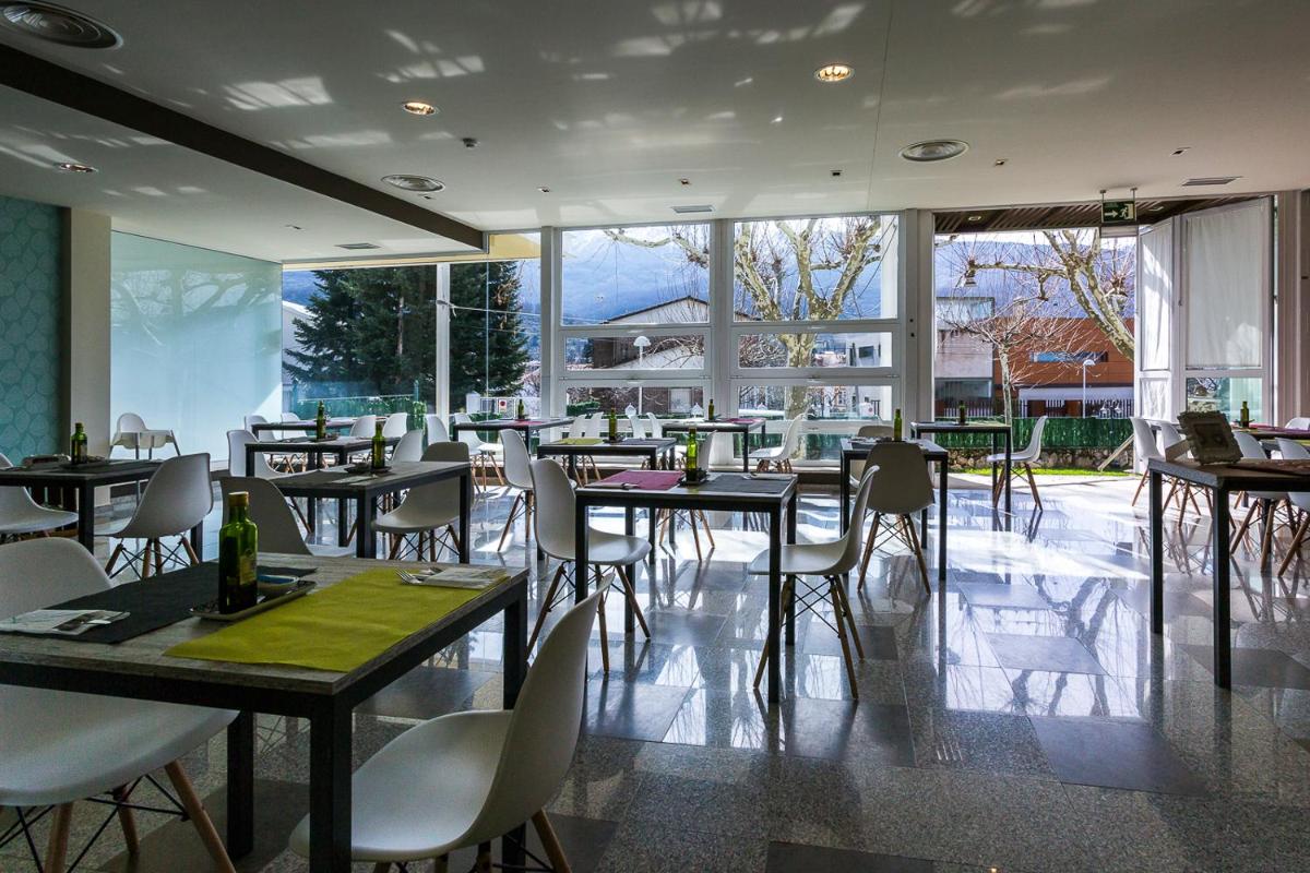 Un restaurante o sitio para comer en Hotel Spa Sinagoga