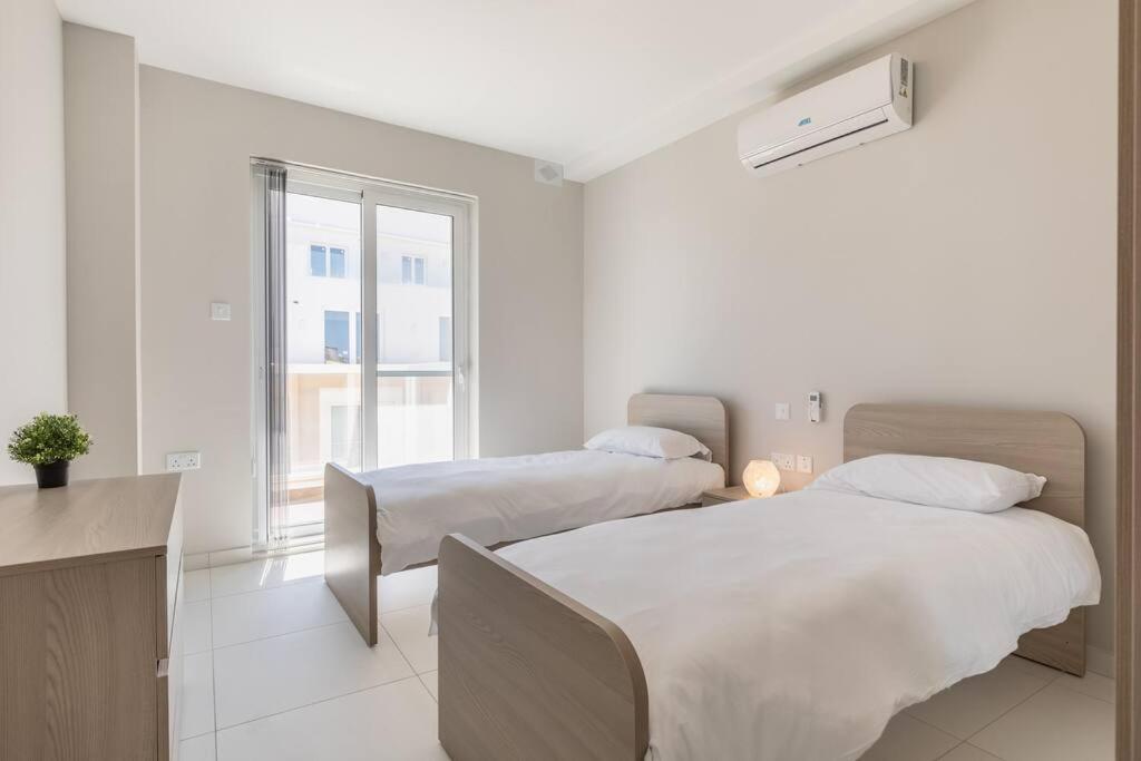 Exquisite modern luxury apt in central Malta - Walking distance to the restaurants & night life - Housity
