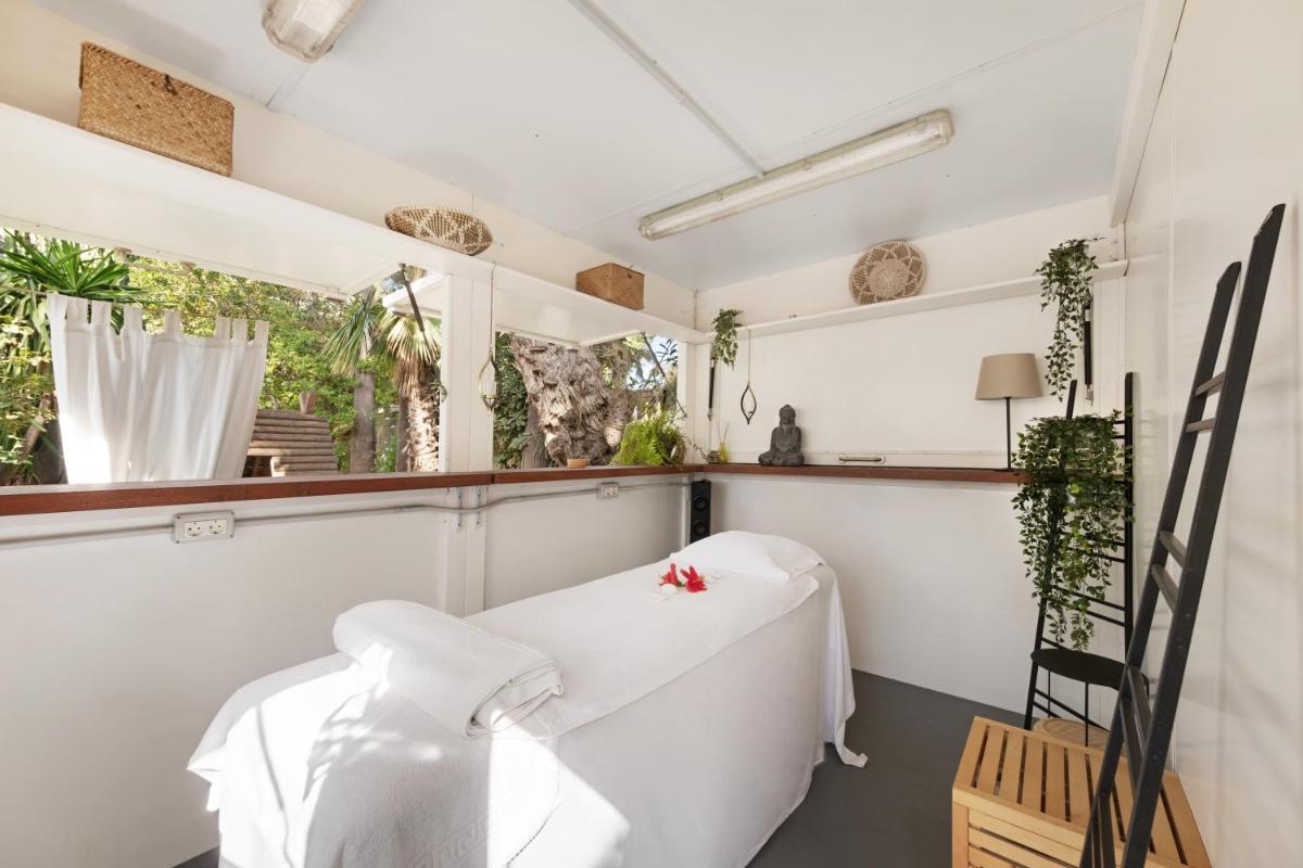 Cama o camas de una habitación en Hotel Ciutat Jardi