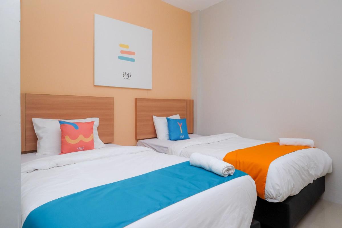 Sans Hotel Tiga Putri Semarang by RedDoorz - Housity