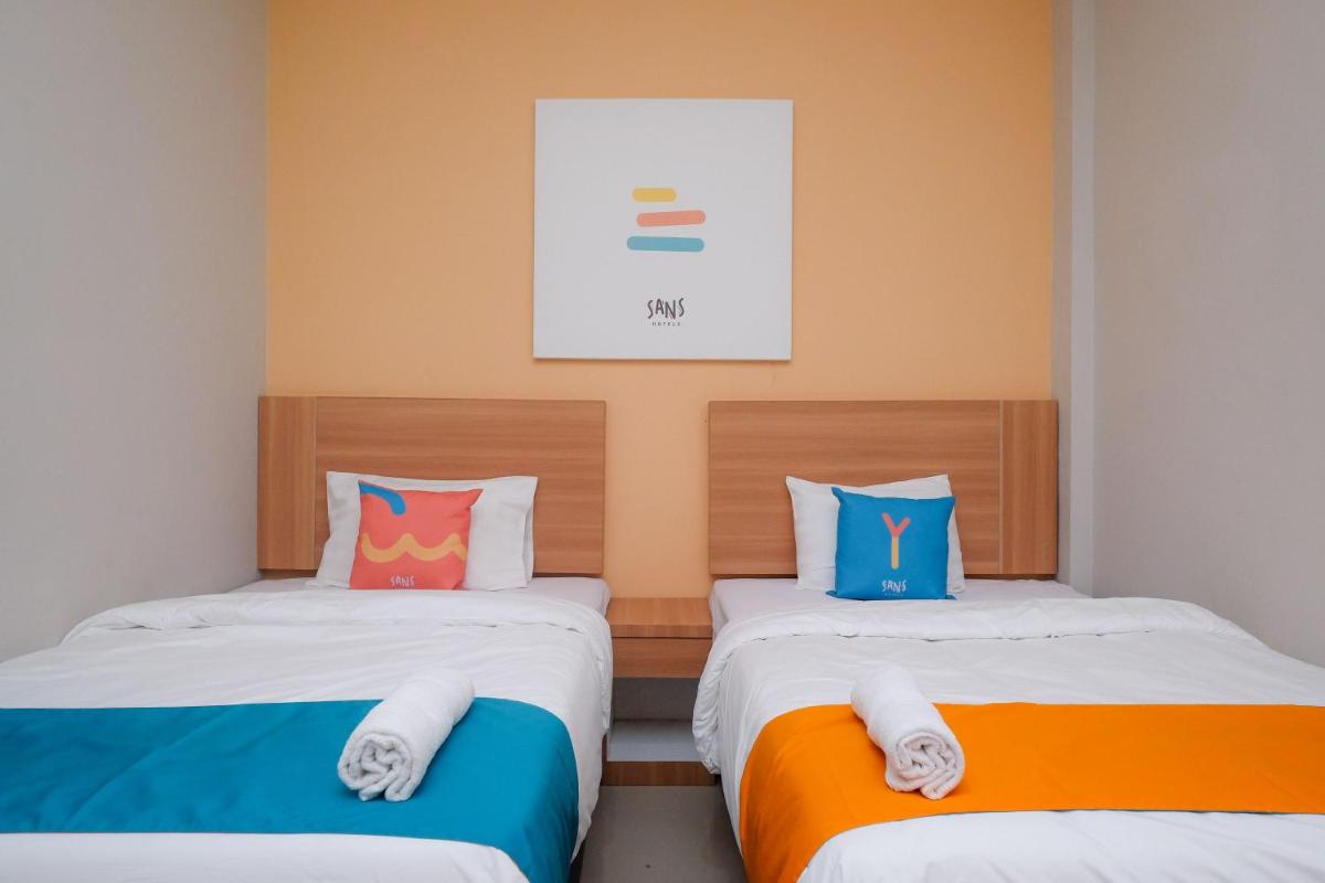 Sans Hotel Tiga Putri Semarang by RedDoorz - Housity