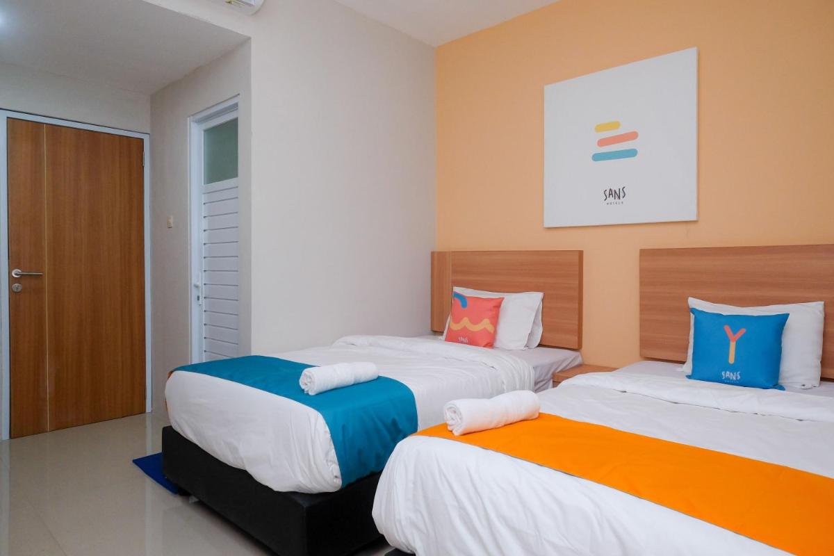 Sans Hotel Tiga Putri Semarang by RedDoorz - Housity