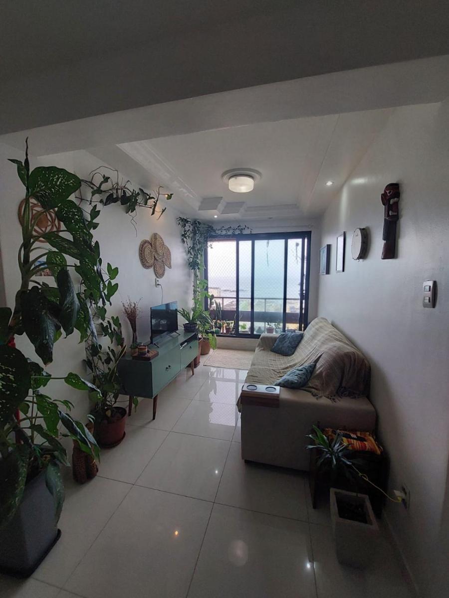 Suíte em apartamento compartilhado, com vista para o mar - Housity