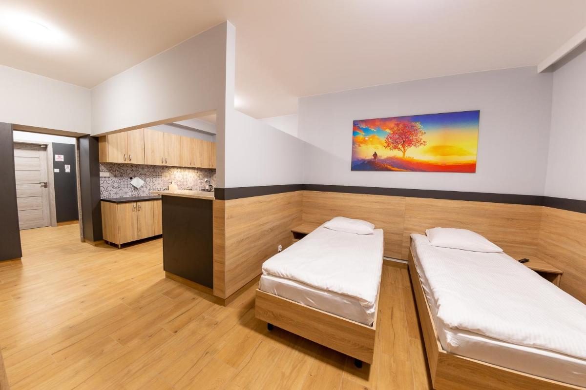 Pokoje Samoobsługowe 24/7 - Housity