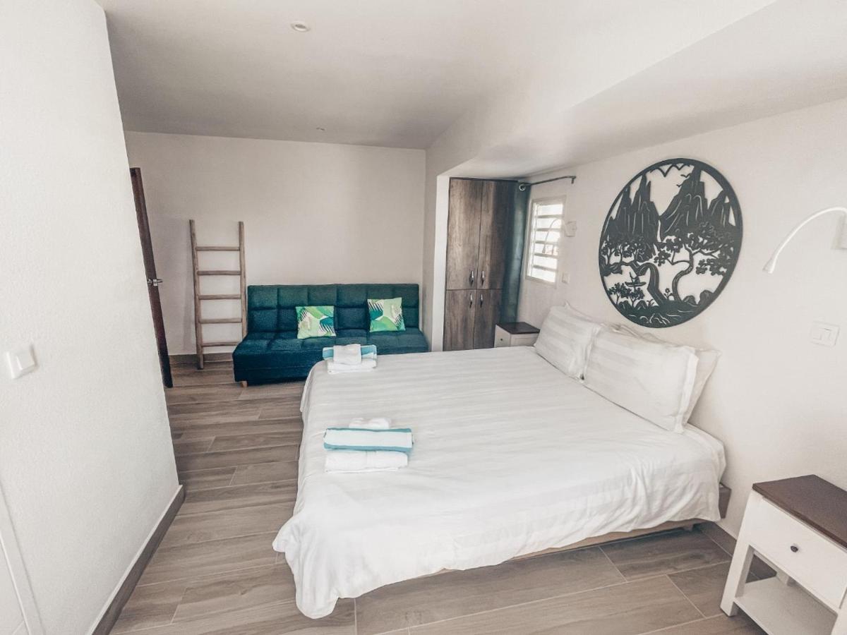 TIKI street side Studio with shared water front terrace at Grand Case - Housity