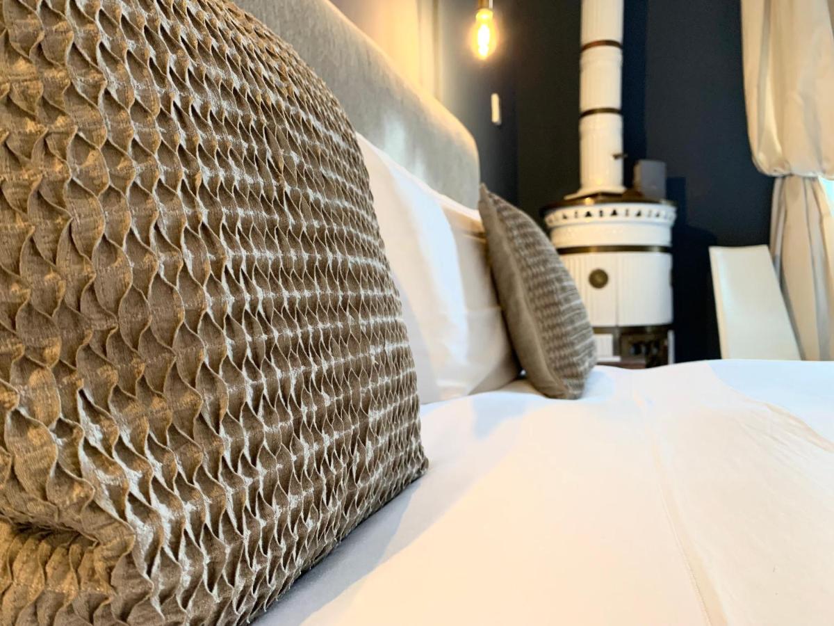 Un ou plusieurs lits dans un hébergement de l'établissement Hôtel Particulier Le 28 - Spa & Art Luxury Design by Alain Ducasse