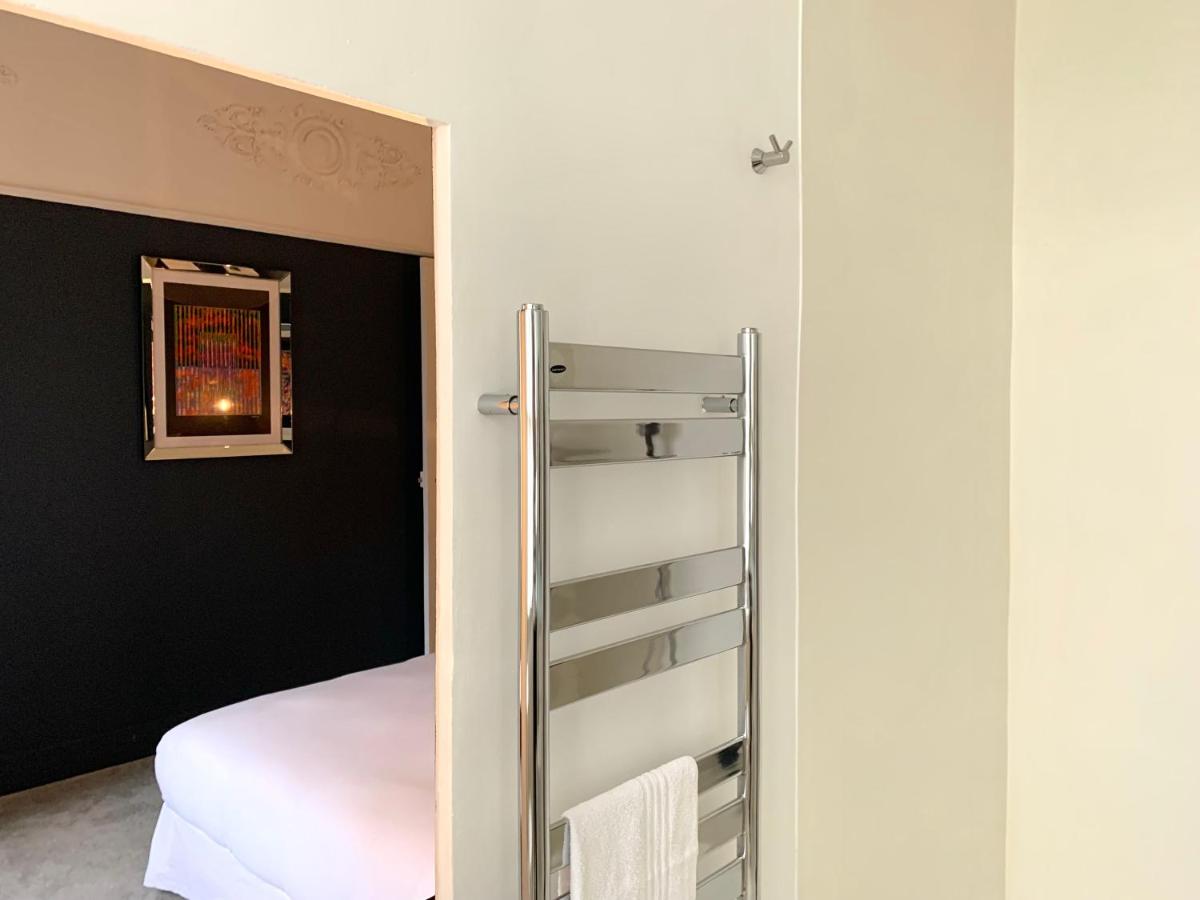 Un ou plusieurs lits dans un hébergement de l'établissement Hôtel Particulier Le 28 - Spa & Art Luxury Design by Alain Ducasse