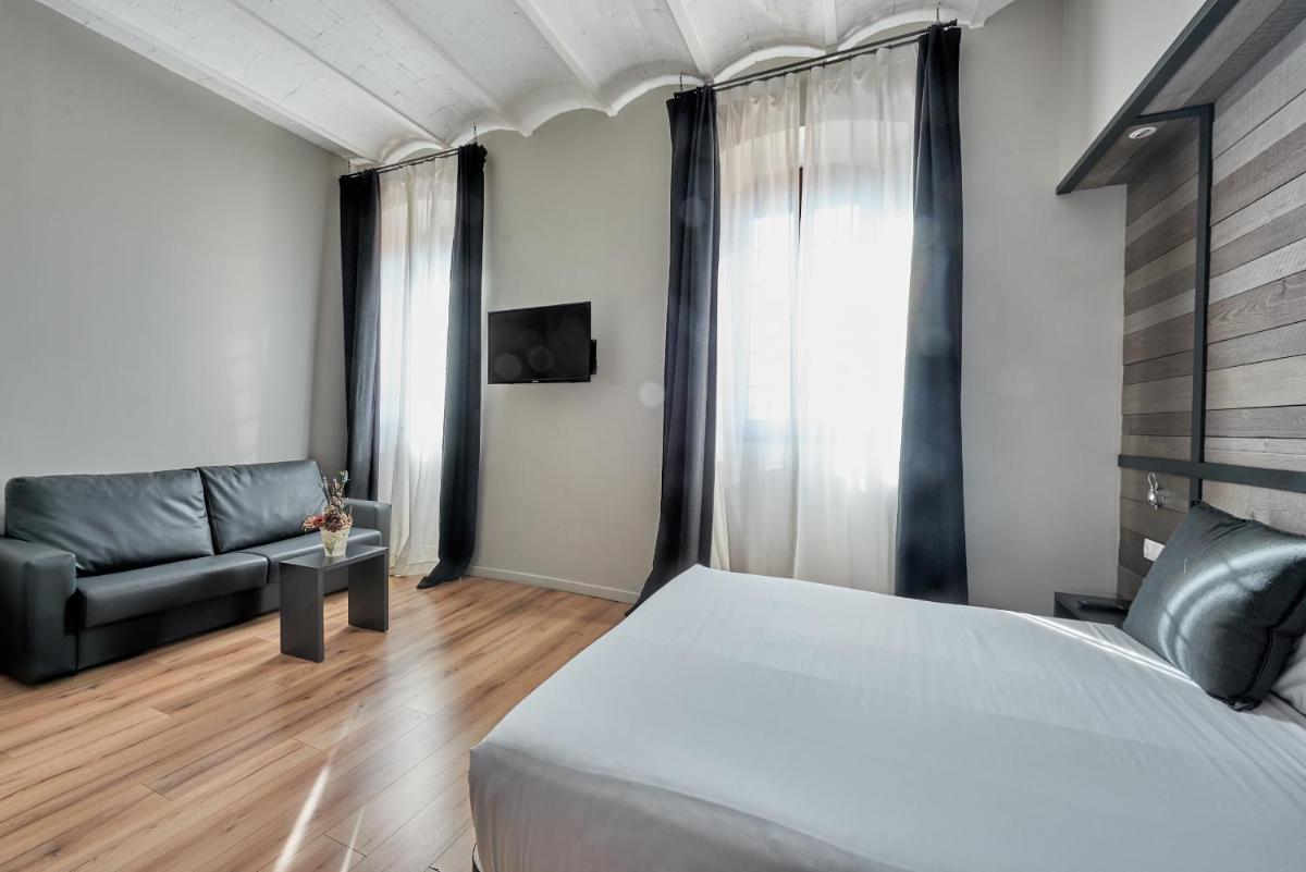 Cama o camas de una habitación en Hotel Parada Puigcerda