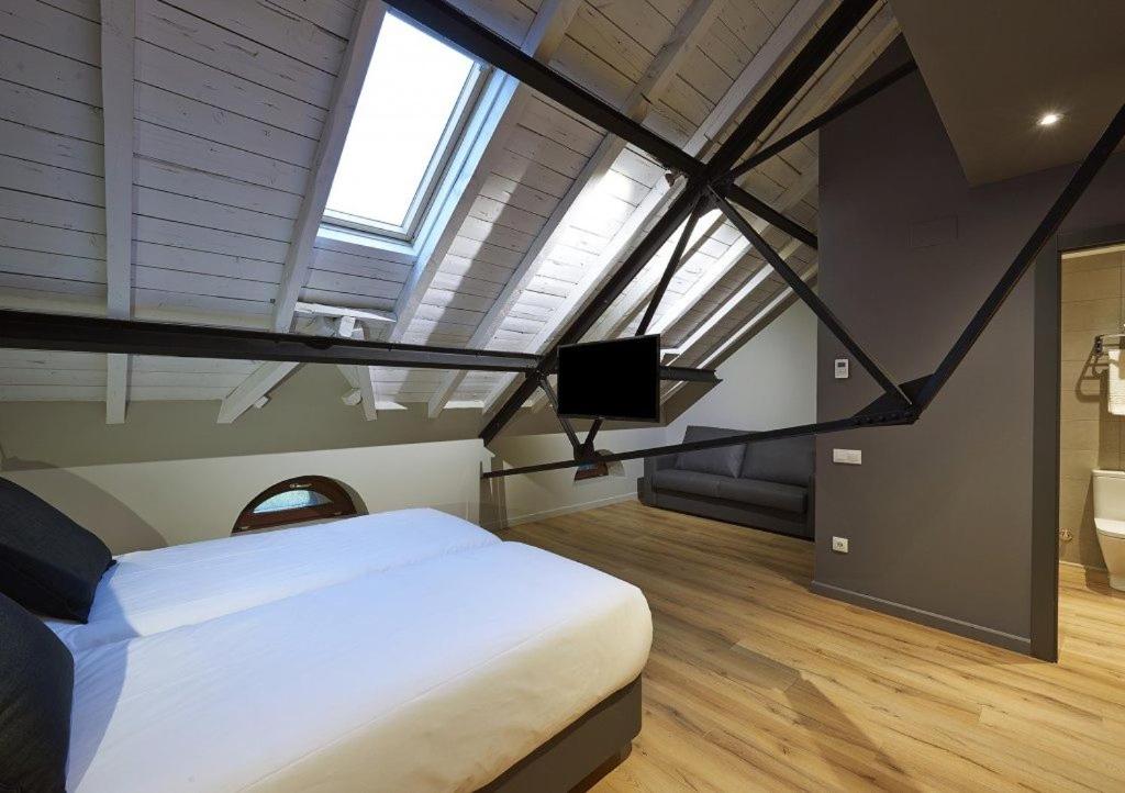Cama o camas de una habitación en Hotel Parada Puigcerda