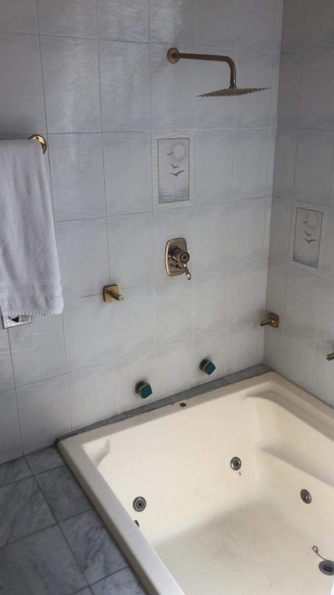 Suitetrails - Suite con decoración antigua en el centro