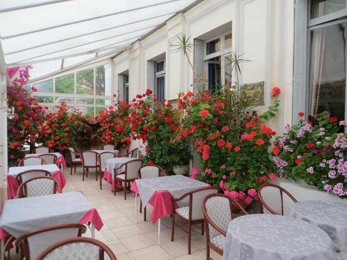 Restaurant ou autre lieu de restauration dans l'établissement Hôtel L'Ecrin