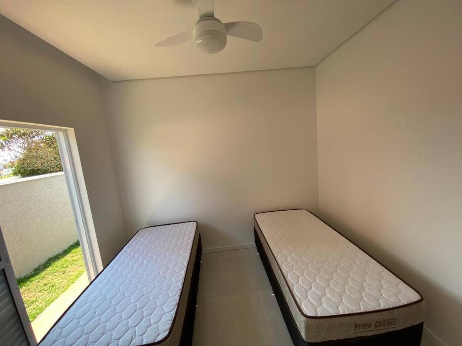 Sua casa no Ninho Verde 2 com piscina climatizada - Housity