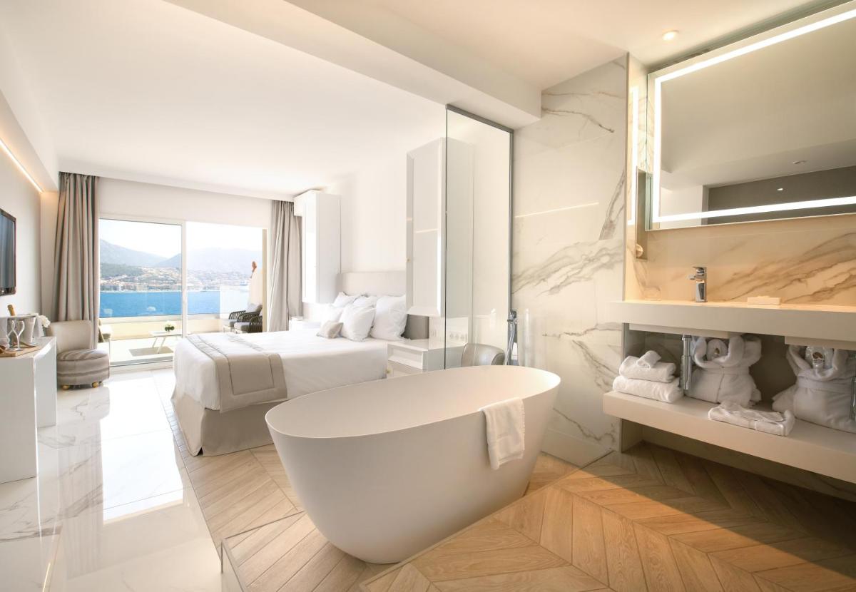 Un ou plusieurs lits dans un hébergement de l'établissement Hôtel Marinca & Spa