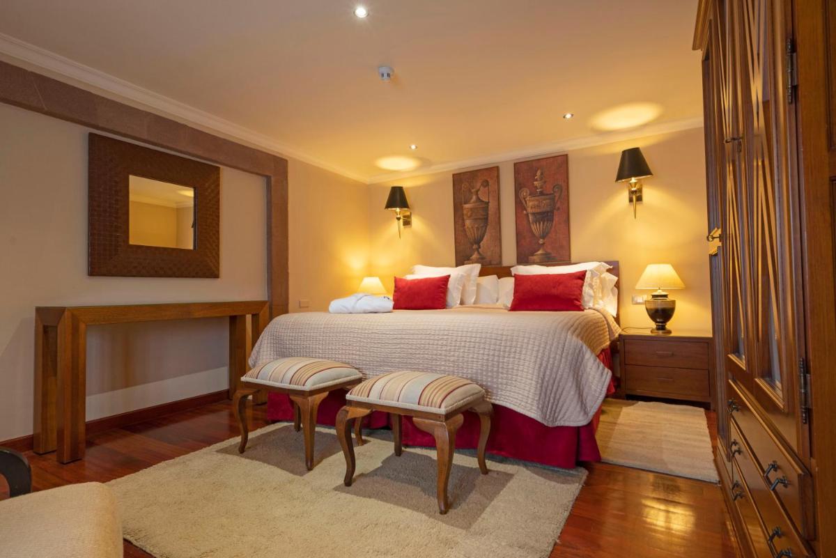 Cama o camas de una habitación en Laguna Nivaria Hotel & Spa