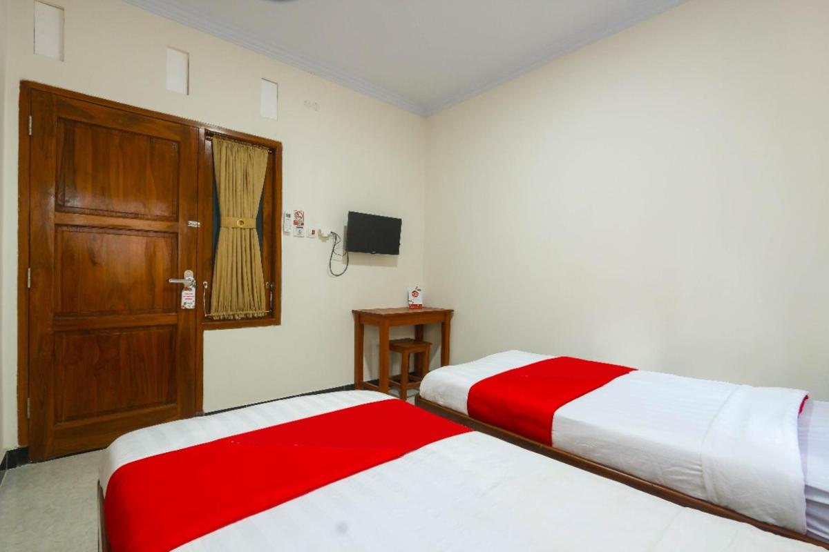 Happy Syariah Hotel - Housity