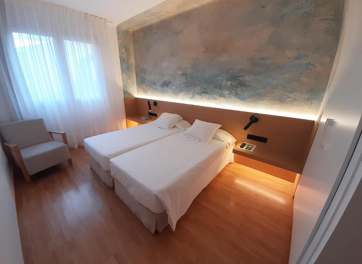 Cama o camas de una habitación en Hotel Rosa & Spa Begur