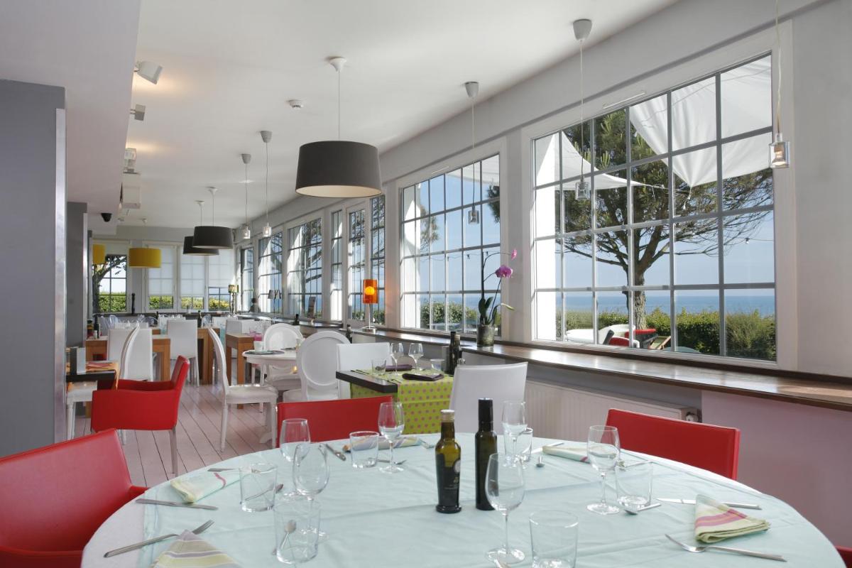 Restaurant ou autre lieu de restauration dans l'établissement The Originals Hôtel Le Cise Restaurant Chambres et Suites