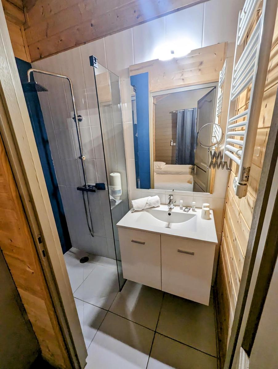 Salle de bains dans l'établissement Lodge Hôtel & Spa Les Voiles du Grand Large