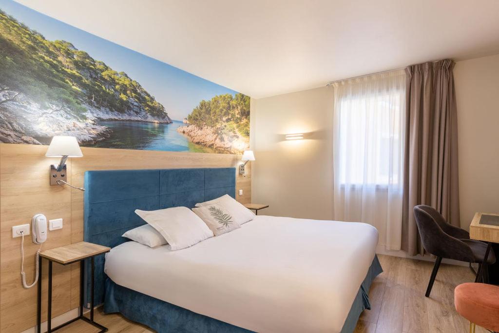 Un ou plusieurs lits dans un hébergement de l'établissement Best Western Hotel & SPA Coeur De Cassis