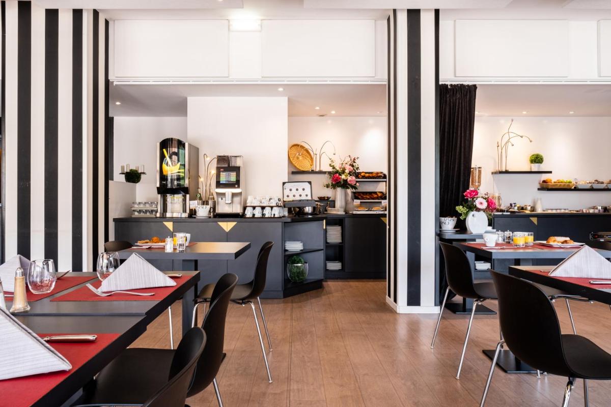 Restaurant ou autre lieu de restauration dans l'établissement Mercure Tours Sud